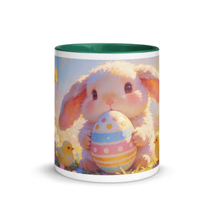 White ceramic mug with dark green interior, featuring a cute bunny holding a colorful Easter egg