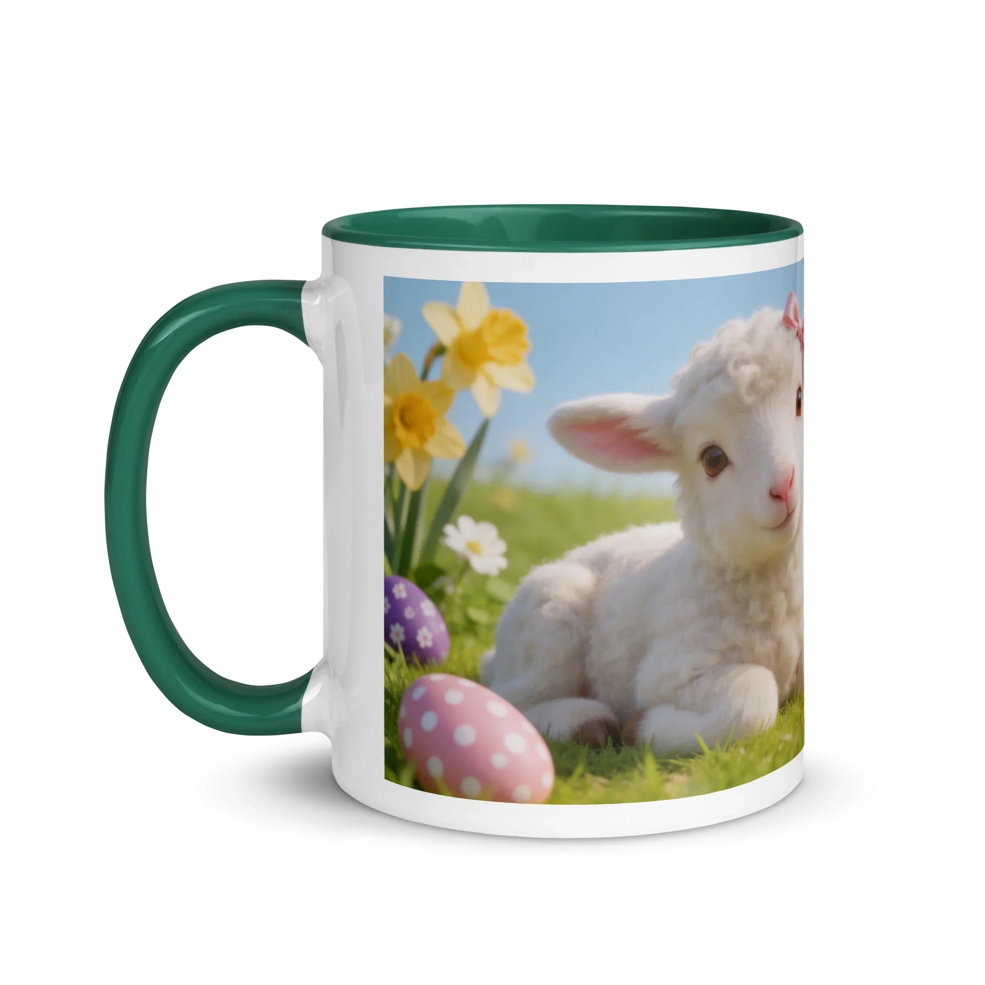 White ceramic mug with green handle and rim, featuring a cute lamb, spring flowers, and Easter eggs.