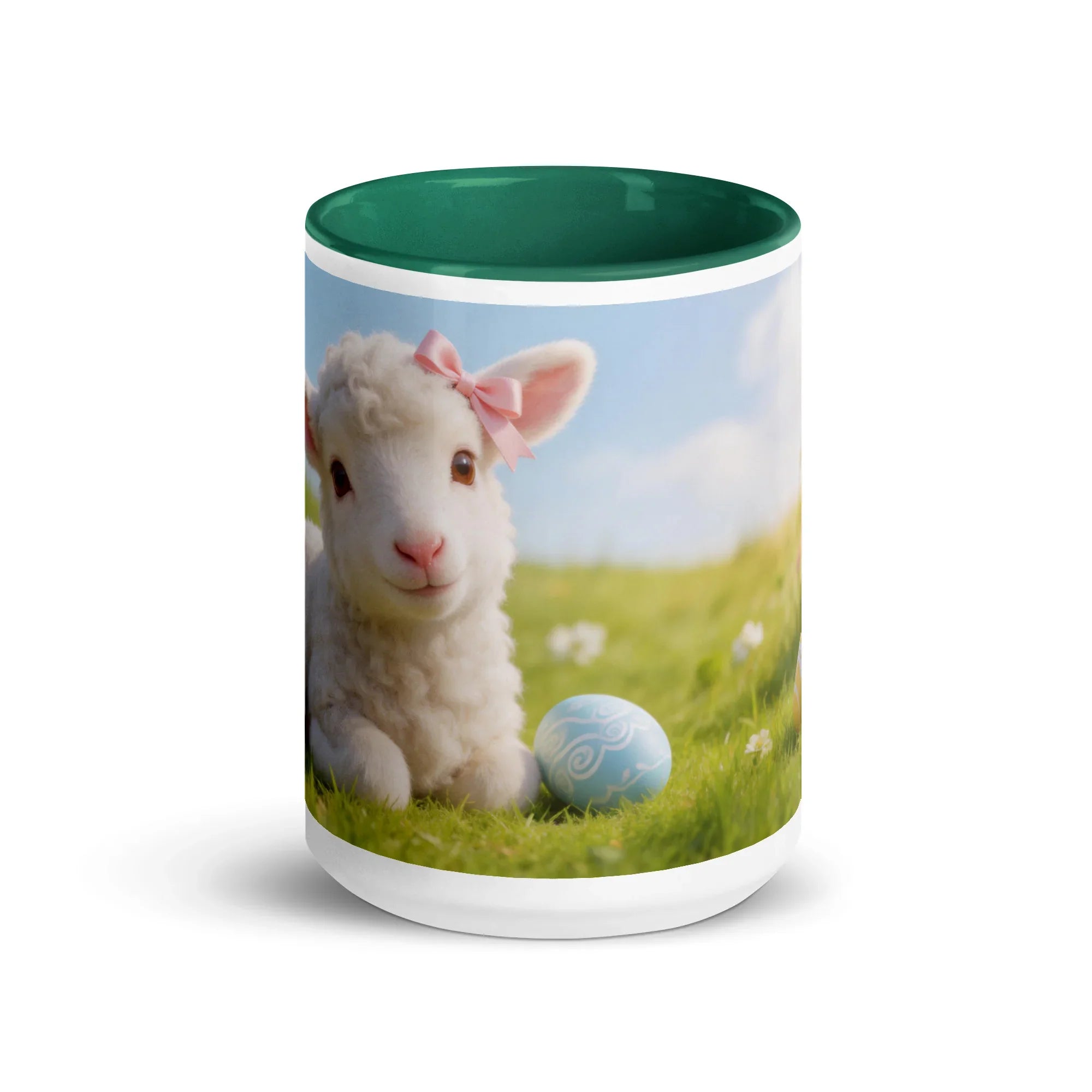 White ceramic mug with dark green interior, featuring a cute lamb with pink bow and decorative egg outdoors.