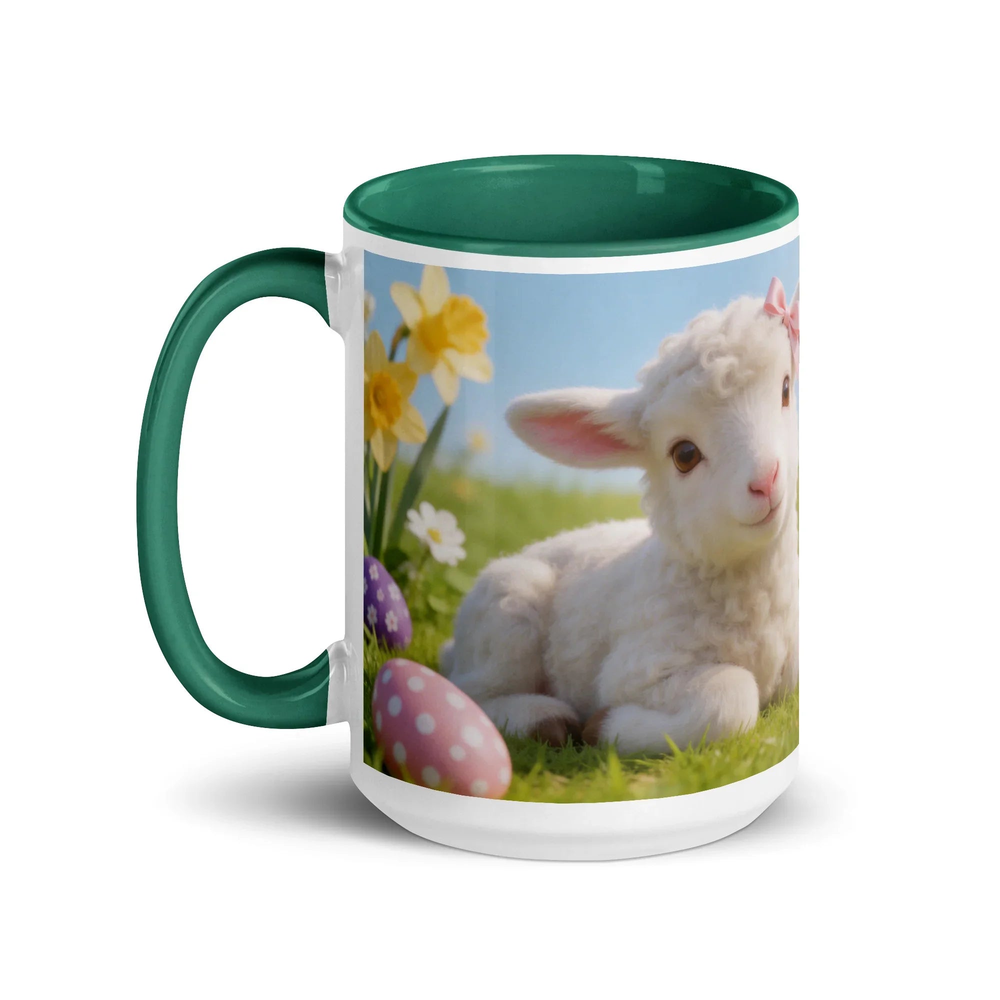 White ceramic mug with dark green handle and interior, featuring a cute lamb, Easter eggs, and spring flowers design.
