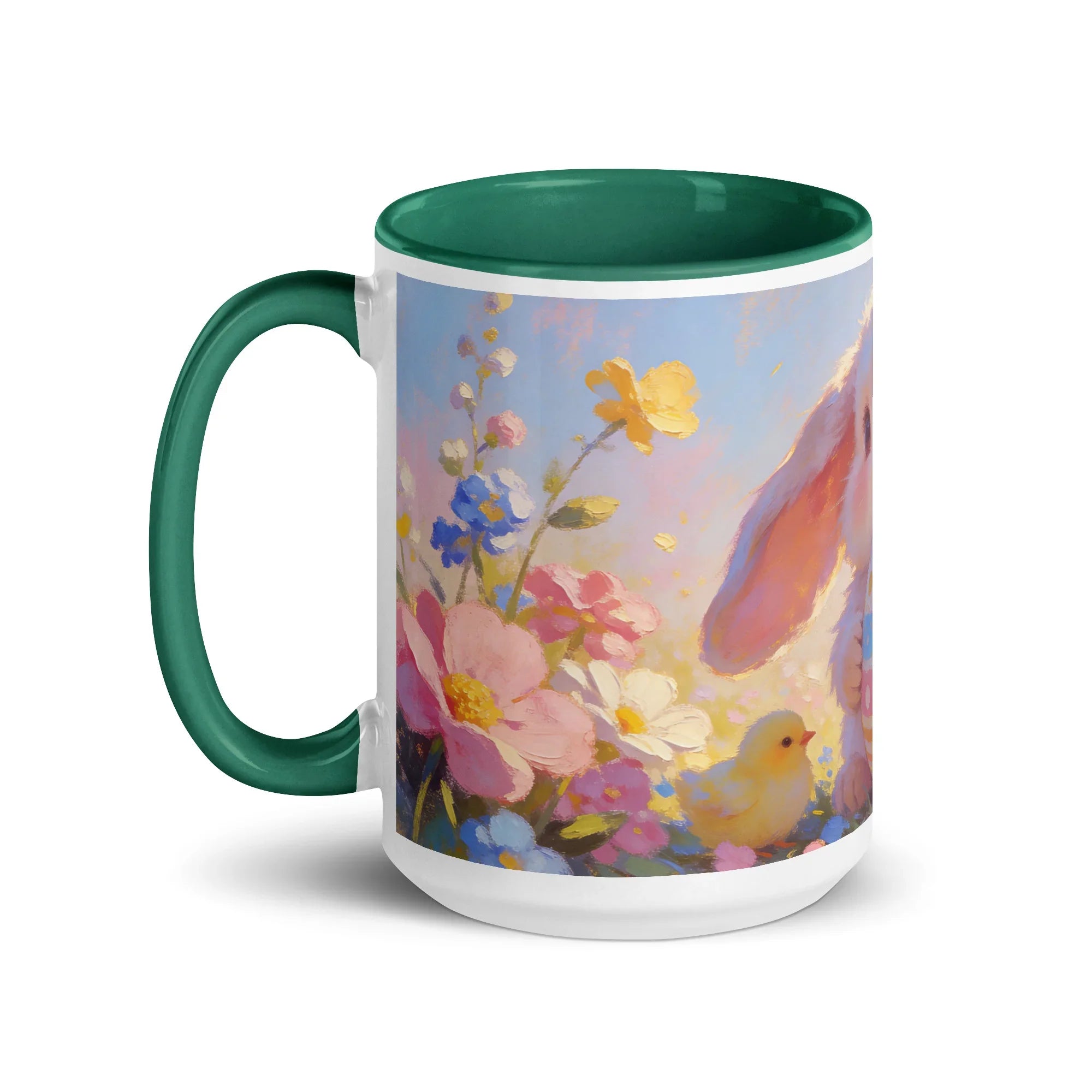 White ceramic mug with dark green handle and interior, pastel floral and bunny design, 15 oz