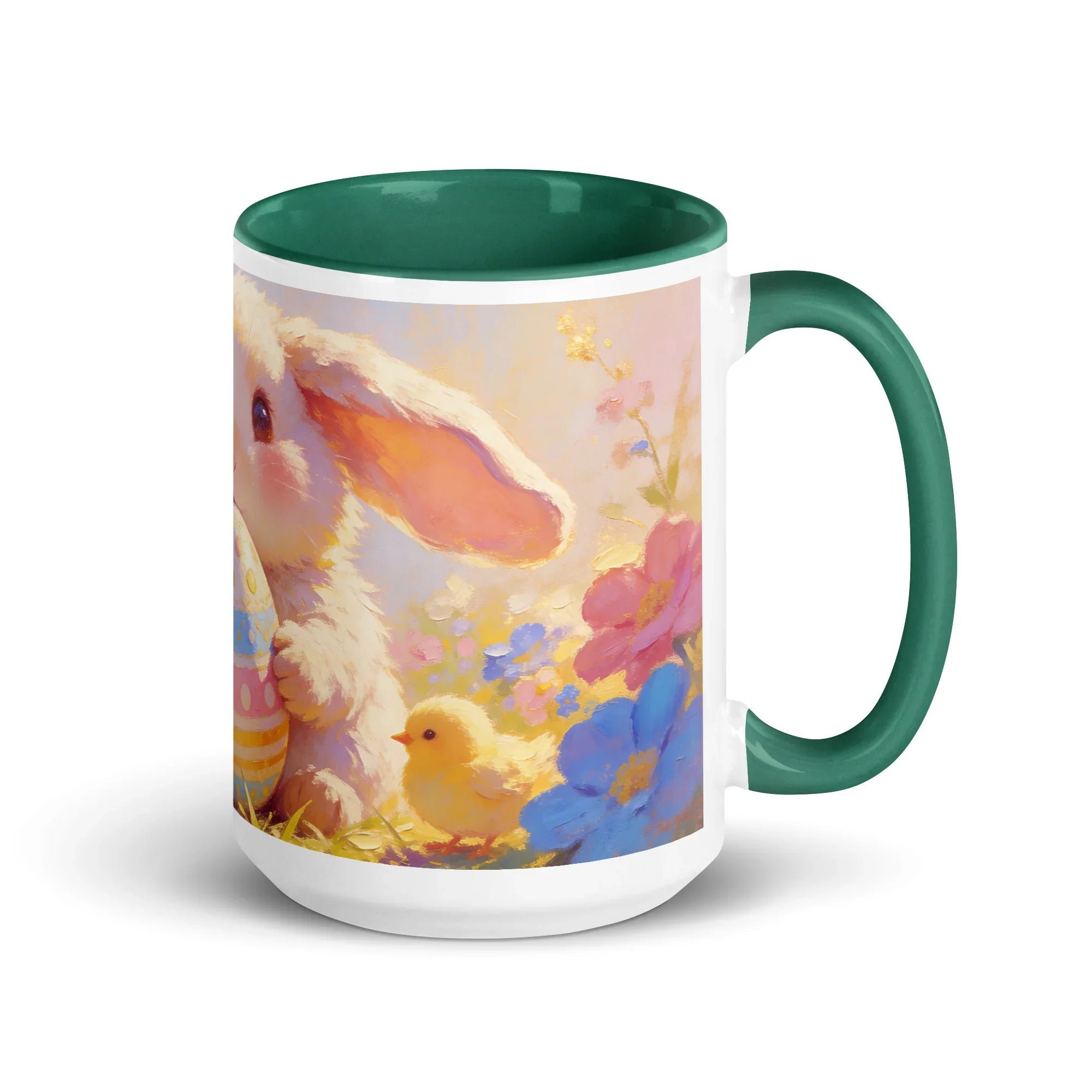 White ceramic mug with dark green interior, featuring a cute bunny, chick, and spring flowers.