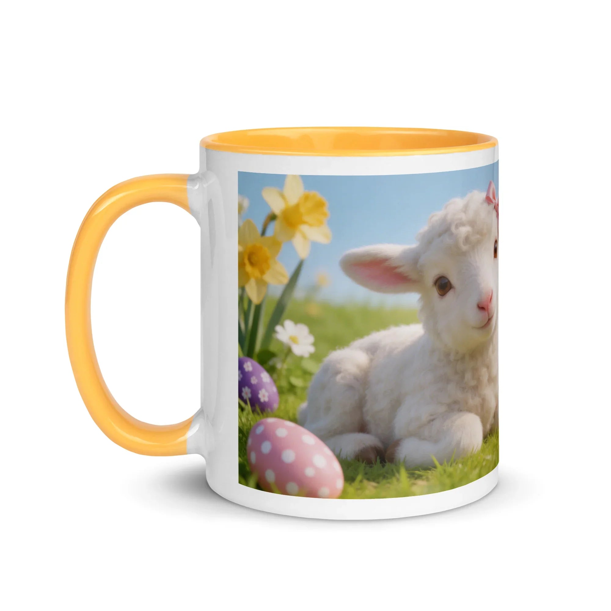 White ceramic mug with yellow handle and inside, featuring a spring lamb, daffodils, and Easter eggs.