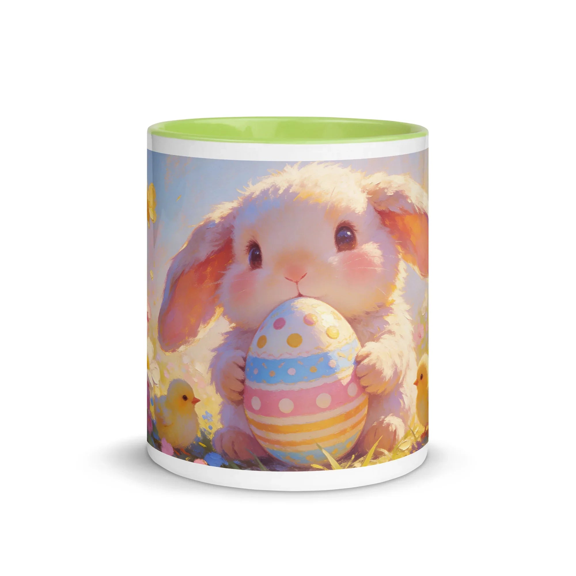 White ceramic mug with green interior featuring a cute bunny holding a decorated Easter egg
