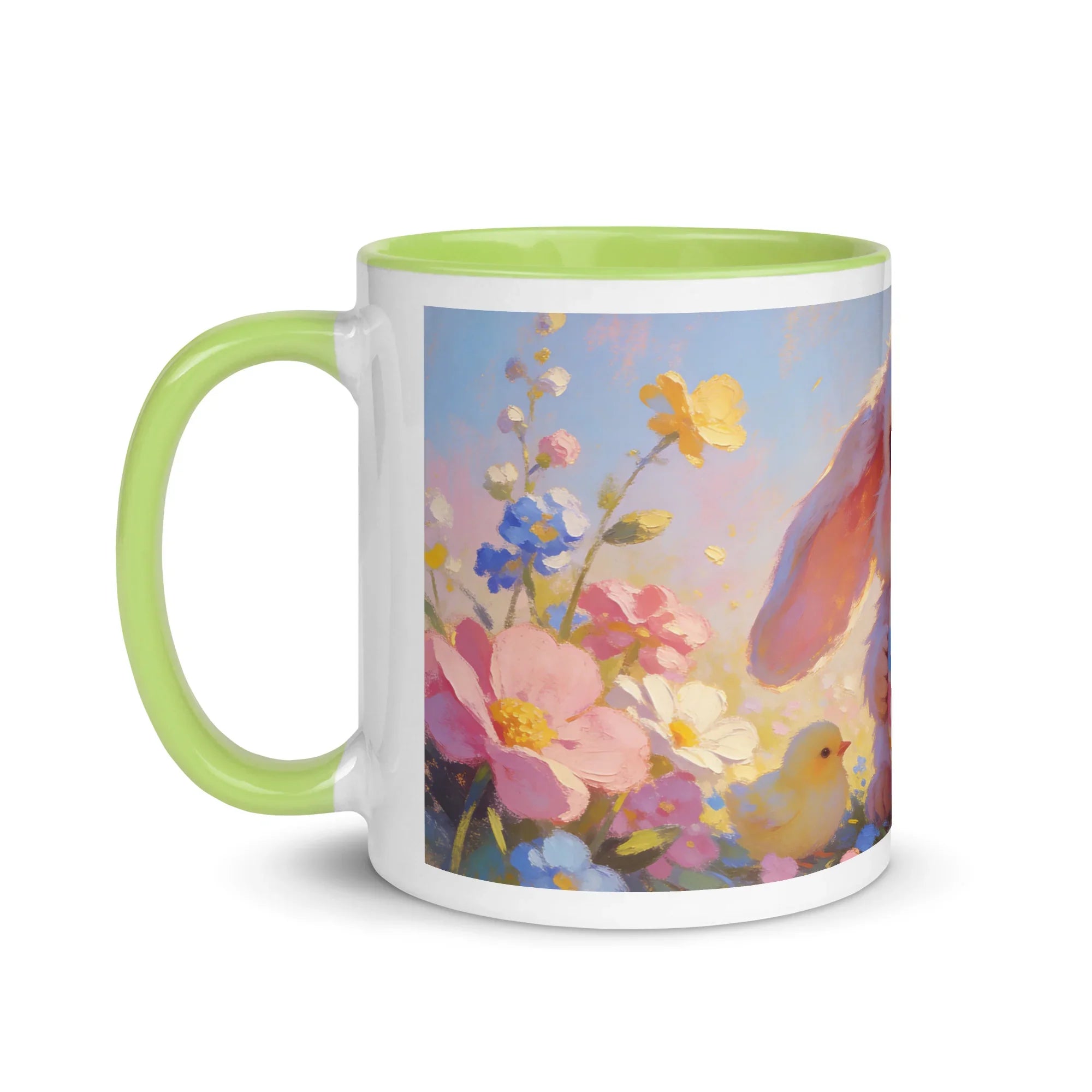 White ceramic mug with light green handle, featuring spring floral design and a bunny illustration.