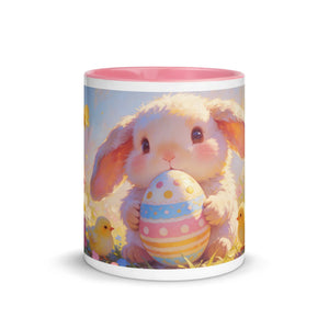 White ceramic mug with pink interior, featuring a cute bunny holding an Easter egg.