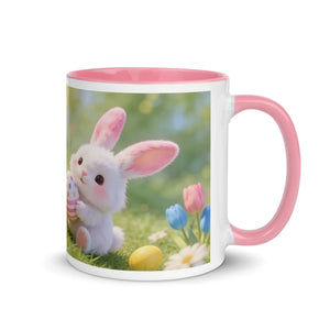White ceramic mug with pink handle, featuring a cute bunny, colorful eggs, and spring flowers.