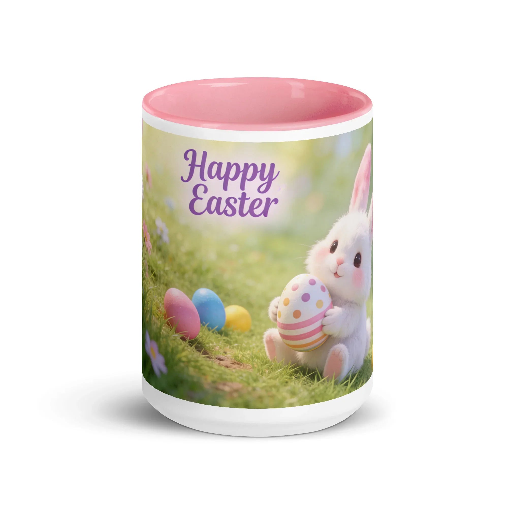 White ceramic mug with pink interior, Easter bunny holding egg, 'Happy Easter' text, spring scene.