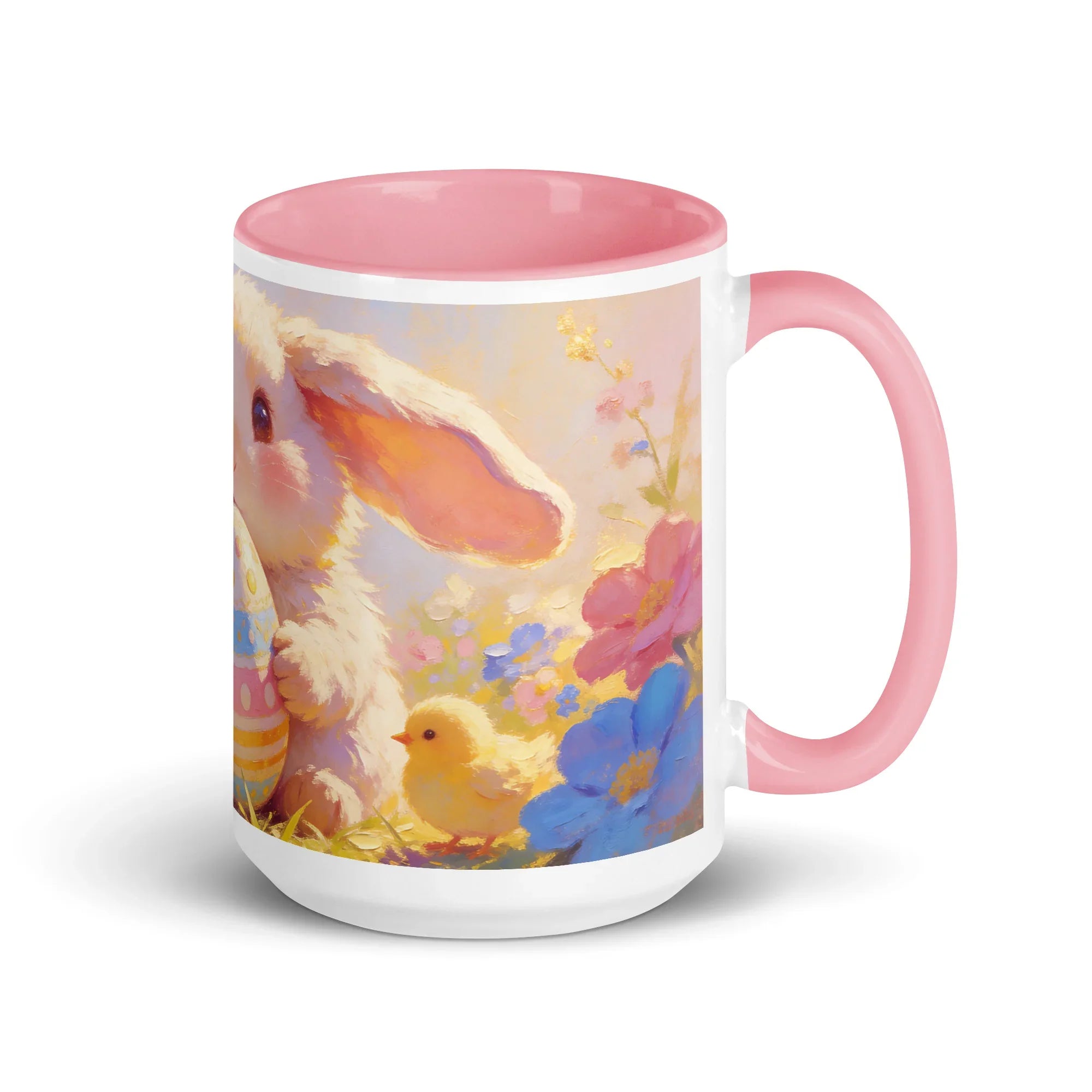 White ceramic mug with pink handle, featuring a bunny, chick, Easter egg, and colorful flowers.