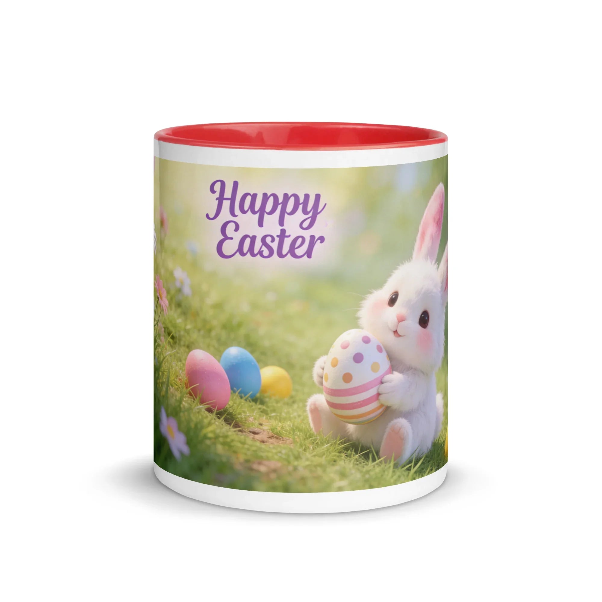White ceramic mug with red interior, featuring a cute bunny holding a decorated Easter egg, colorful eggs on grass, and 'Happy Easter' text.