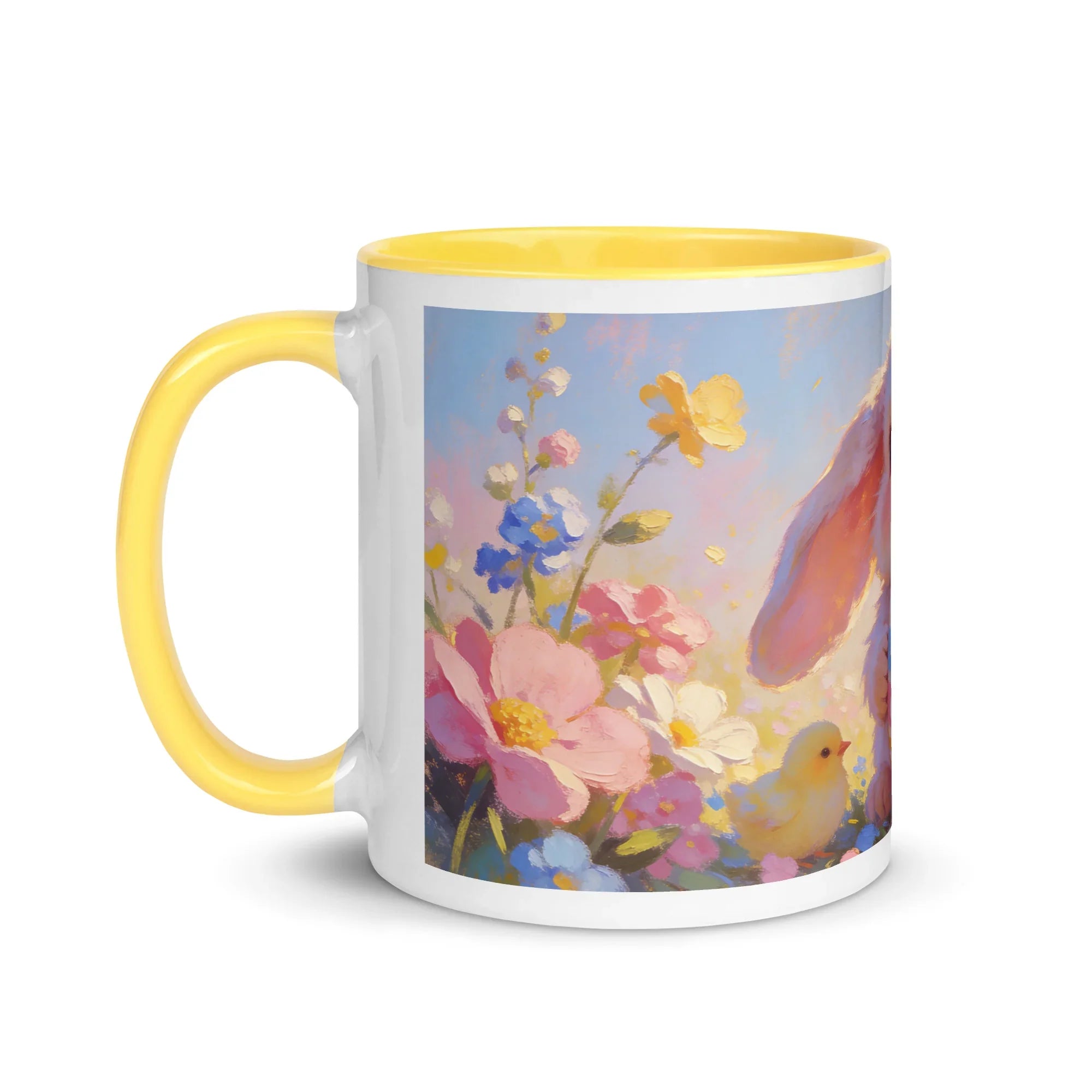 White ceramic mug with yellow handle, featuring a spring floral and bunny design