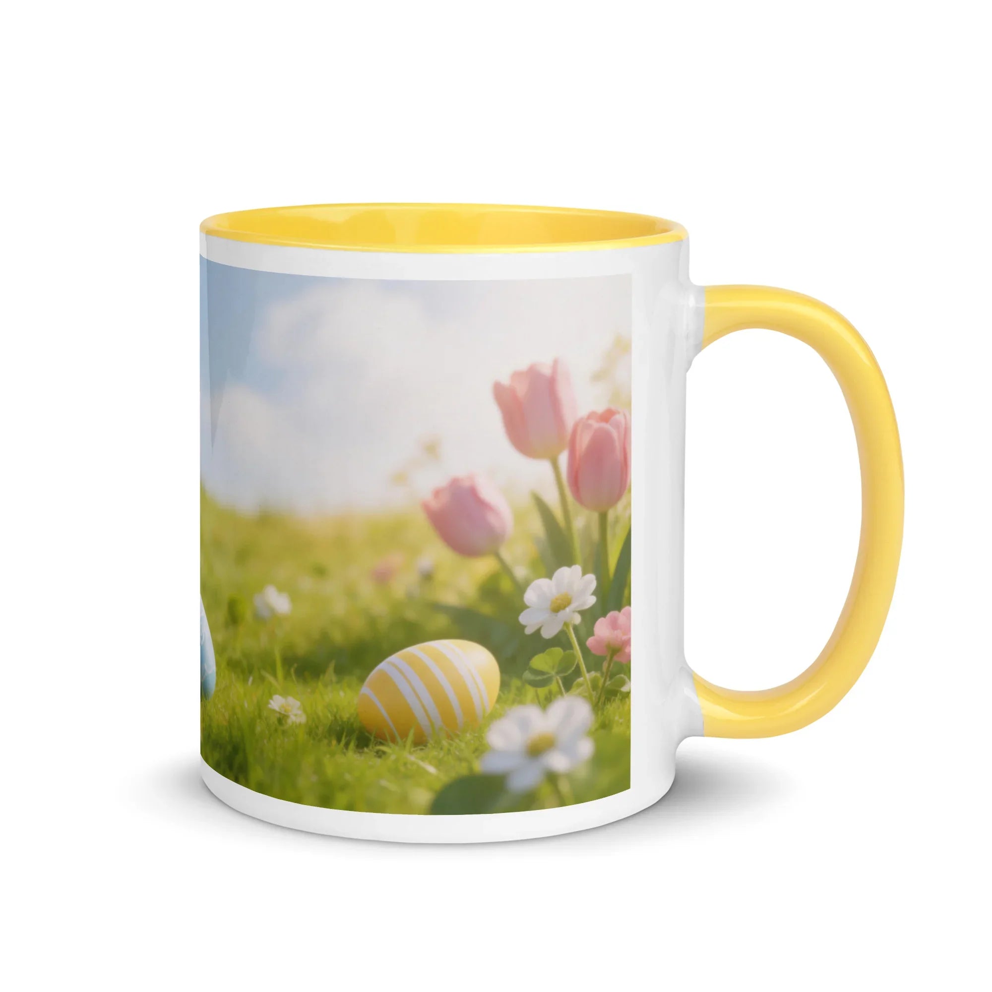 White ceramic mug with yellow interior and handle, featuring spring flowers and Easter eggs design.