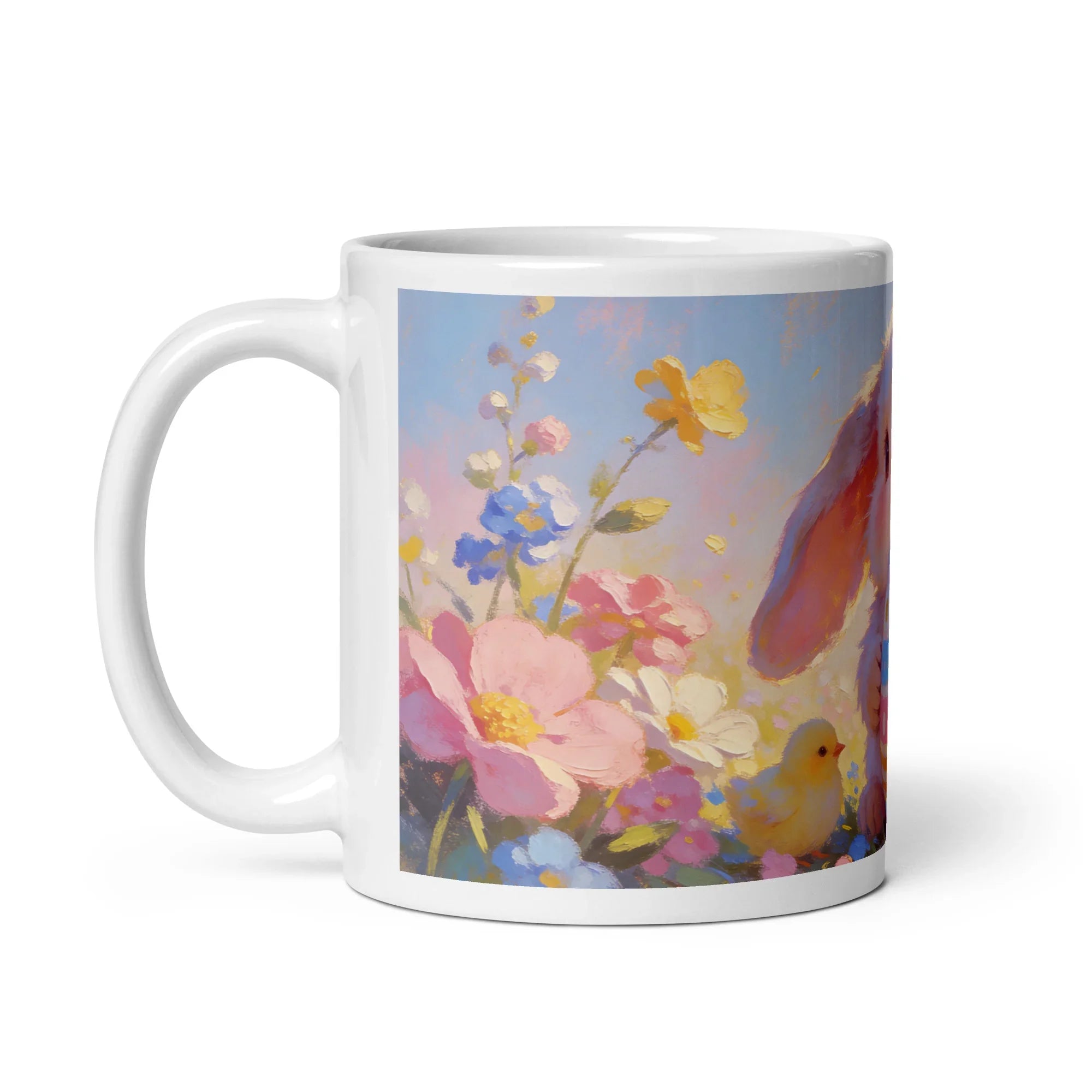 White ceramic mug with pastel floral artwork, bunny ear, and chick illustration
