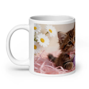 White glossy mug with image of cute kitten, daisies, pink straw, handle on left, 20 oz